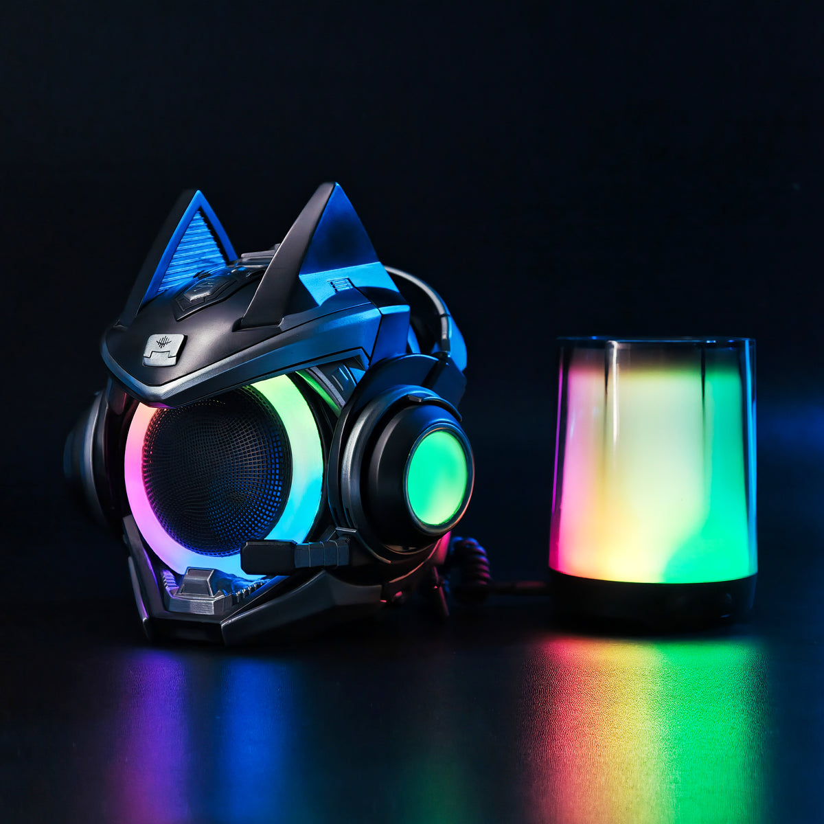 Black OLLIE speaker beside an ambient RGB light